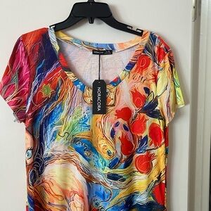 4 Noracora Dresses. Very colorful and vibrant and super comfy and classy!